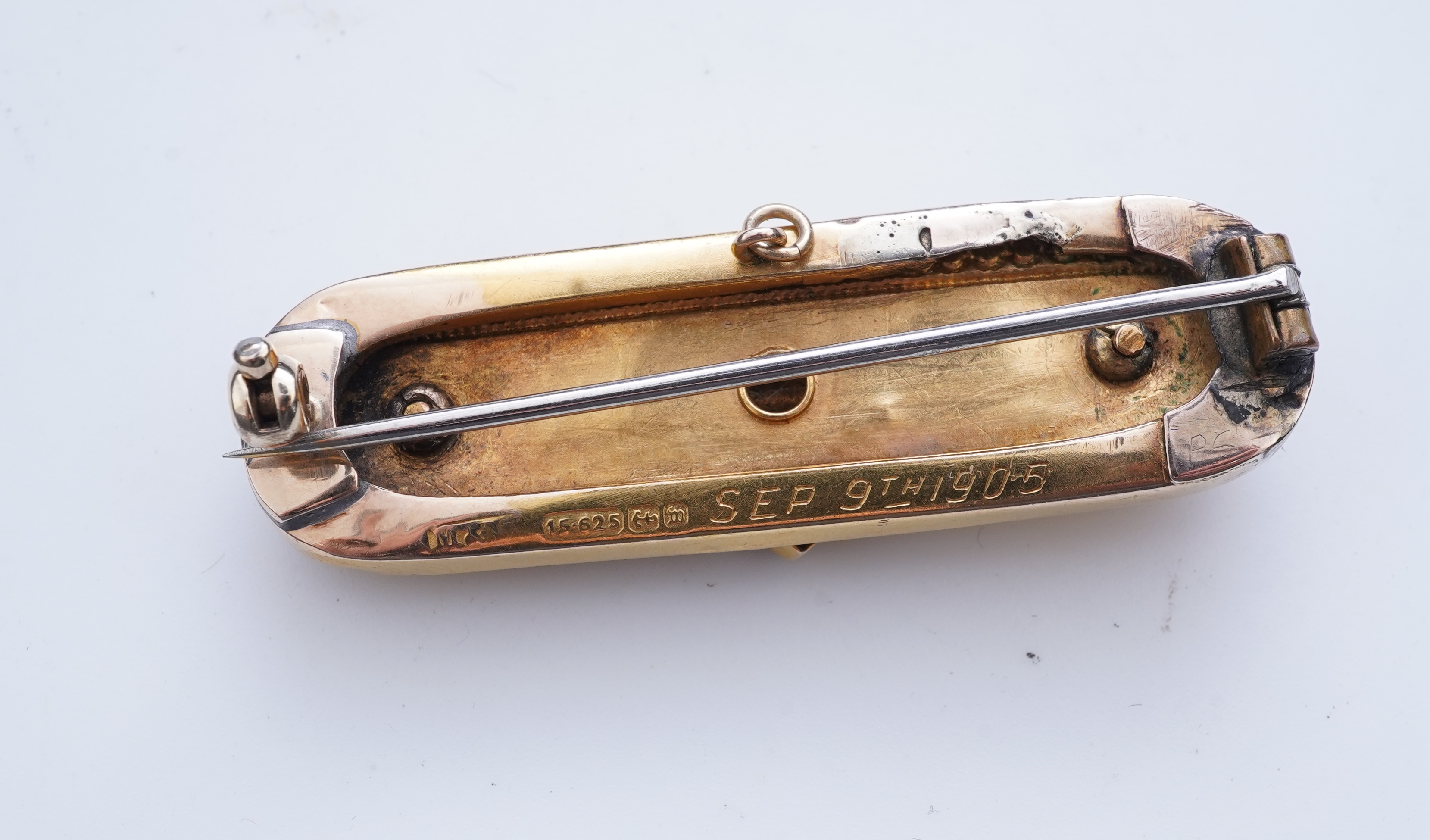 An Edwardian gold and seed pearl brooch, circa 1896